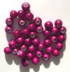 40 6mm Round Fuchsia Miracle Beads